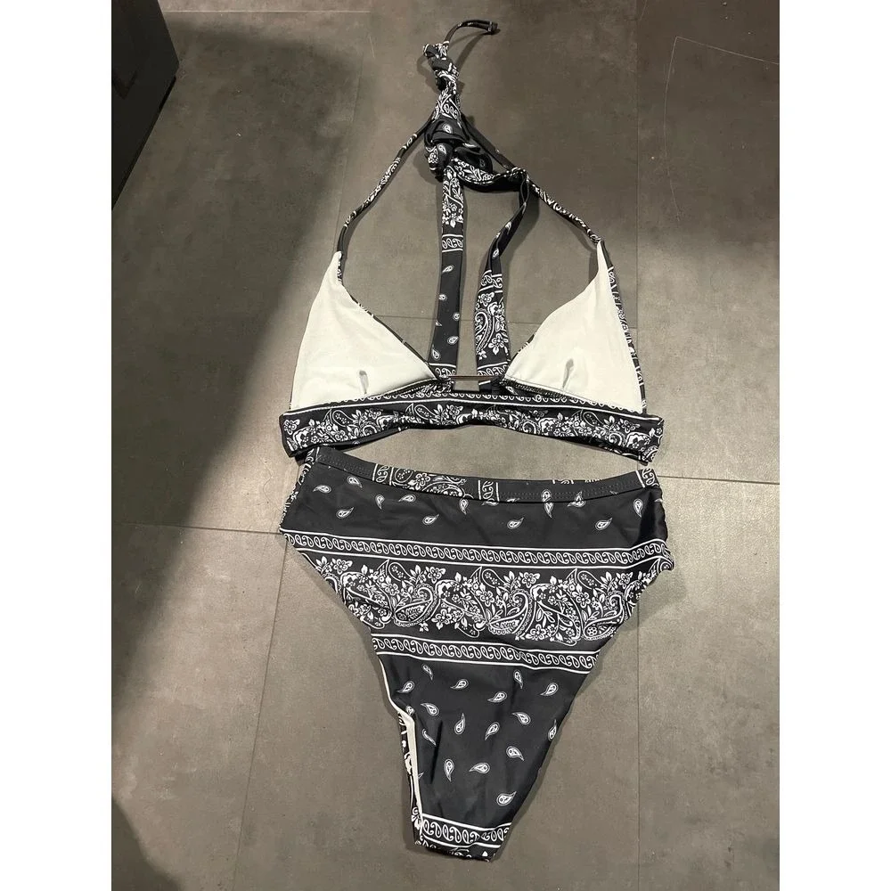 Black and white‎ suitcase, swimwear size small A-143